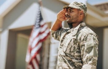 Veteran with tinnitus salutes
